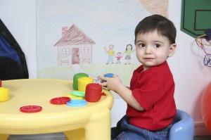 Adorable Preschooler Playing with Colorful Dough